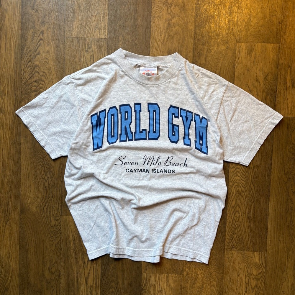 Vintage 1996 World Gym Arch Logo Seven Mile Beach Cayman Islands Graphic T Shirt